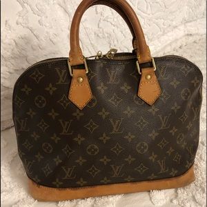Authentic, vintage, Louis Vuitton Alma bag.